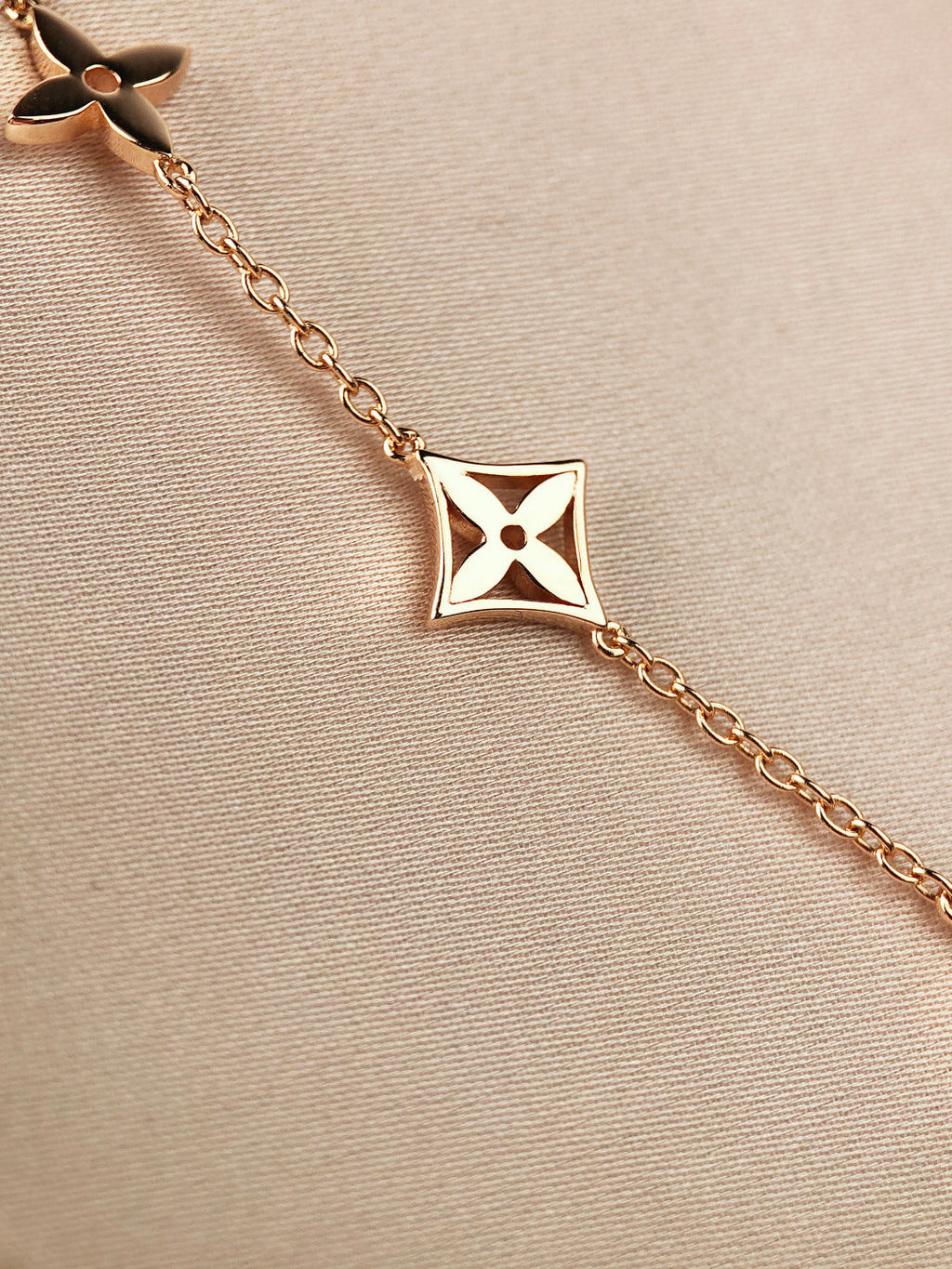 TimiSTAR AND SUN 7 MOTIFS GOLD BRACELET