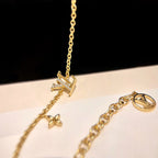 TimiLOGO STAR MOTIF GOLD BRACELET