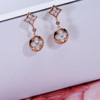 TimiSTAR AND SUN PINK GOLD MOP DROP EARRINGS