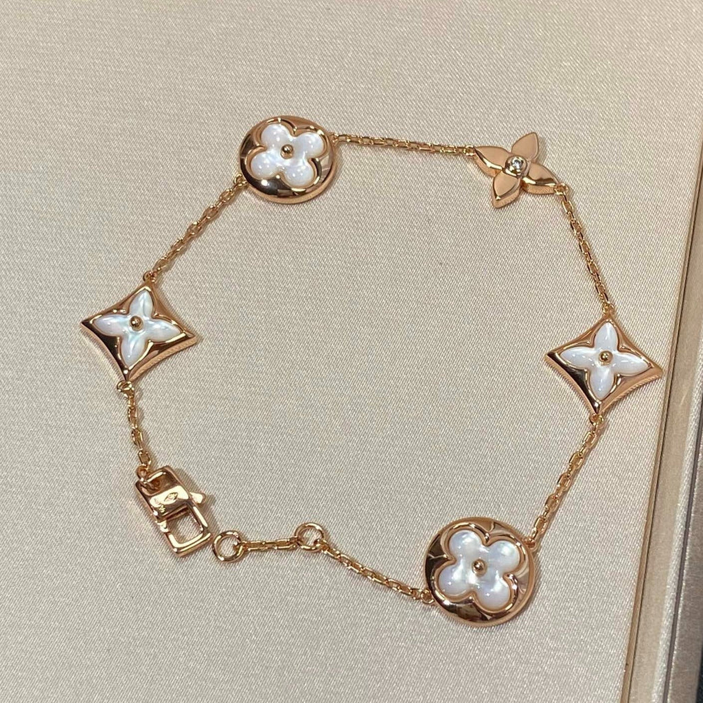 TimiSTAR AND SUN 5 MOTIF MOP PINK GOLD BRACELET