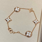 TimiSTAR AND SUN 5 MOTIF MOP PINK GOLD BRACELET
