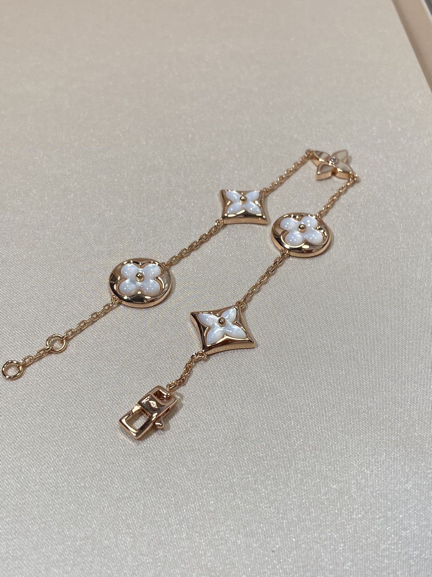 TimiSTAR AND SUN 5 MOTIF MOP PINK GOLD BRACELET