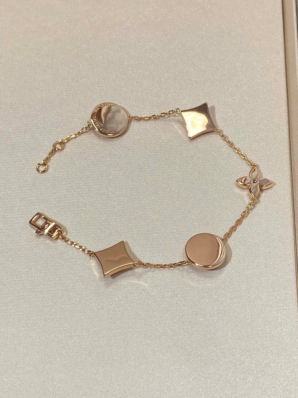 TimiSTAR AND SUN 5 MOTIF MOP PINK GOLD BRACELET