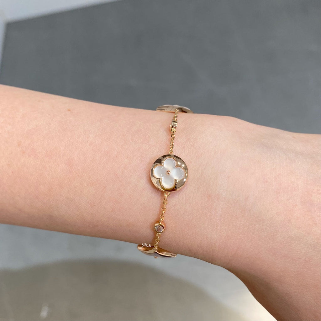 TimiSTAR AND SUN 4 MOTIF WHITE MOP PINK GOLD BRACELET