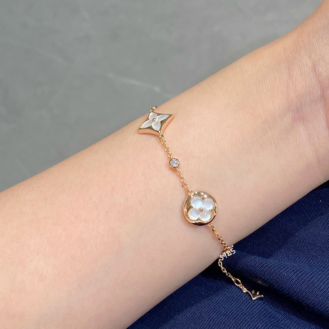 TimiSTAR AND SUN 4 MOTIF WHITE MOP PINK GOLD BRACELET