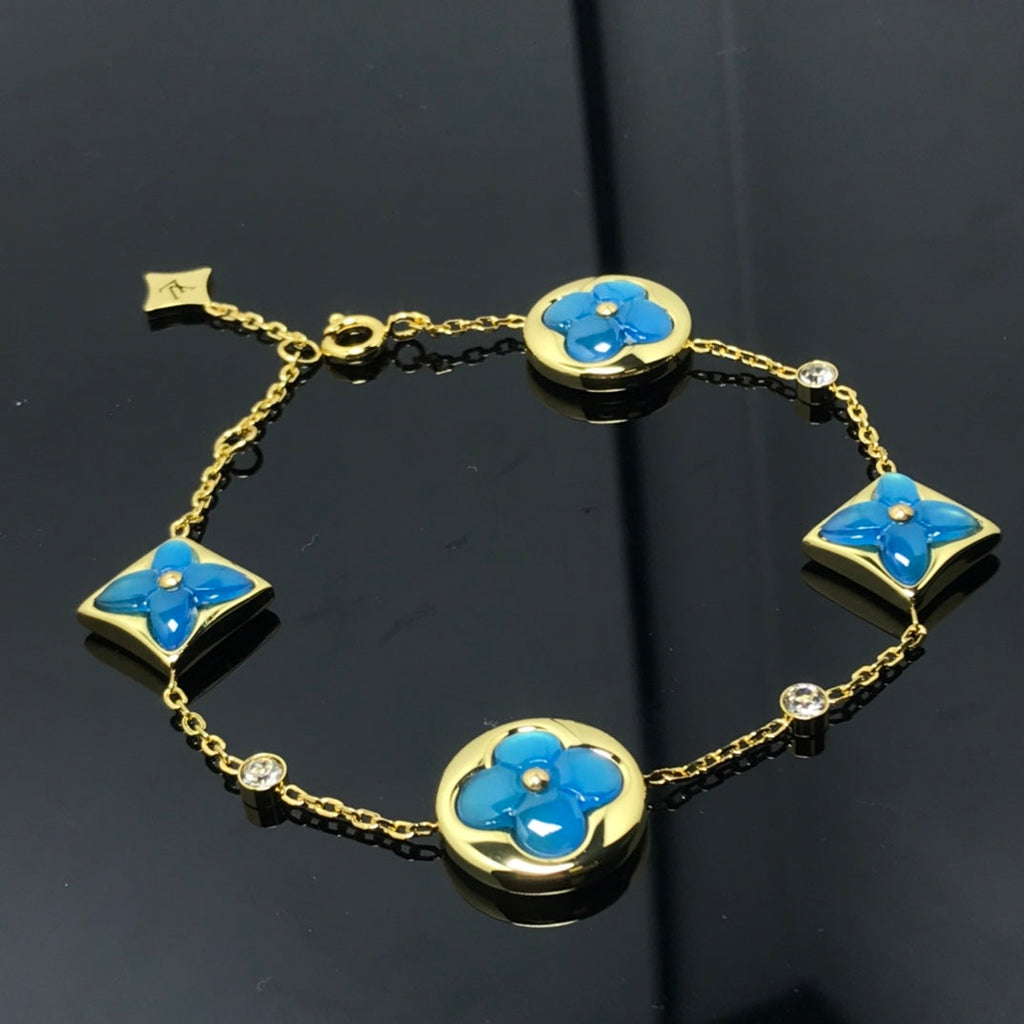 TimiSTAR AND SUN 4 MOTIF BLUE BRACELET