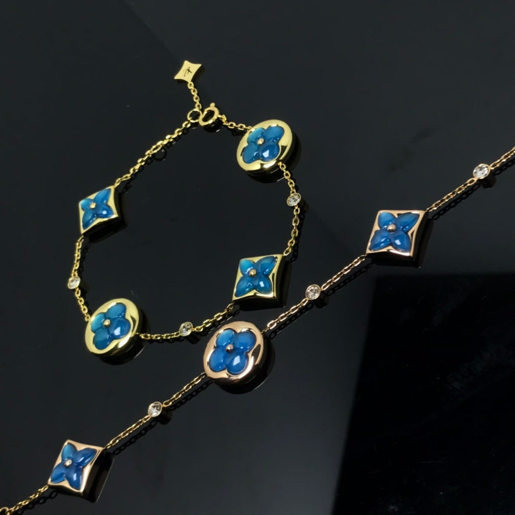 TimiSTAR AND SUN 4 MOTIF BLUE BRACELET