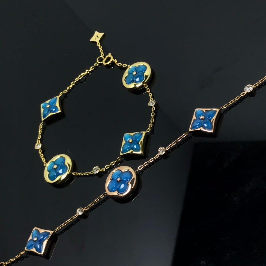 TimiSTAR AND SUN 4 MOTIF BLUE BRACELET